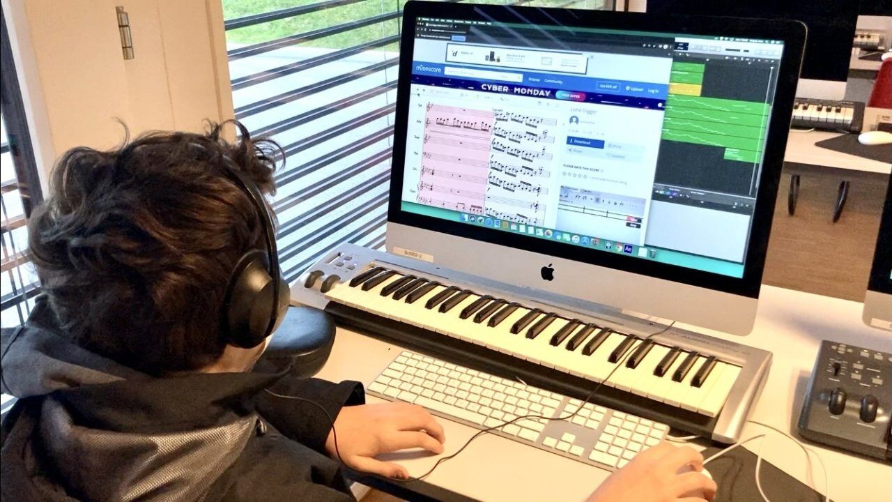 Student playing piano - ISL